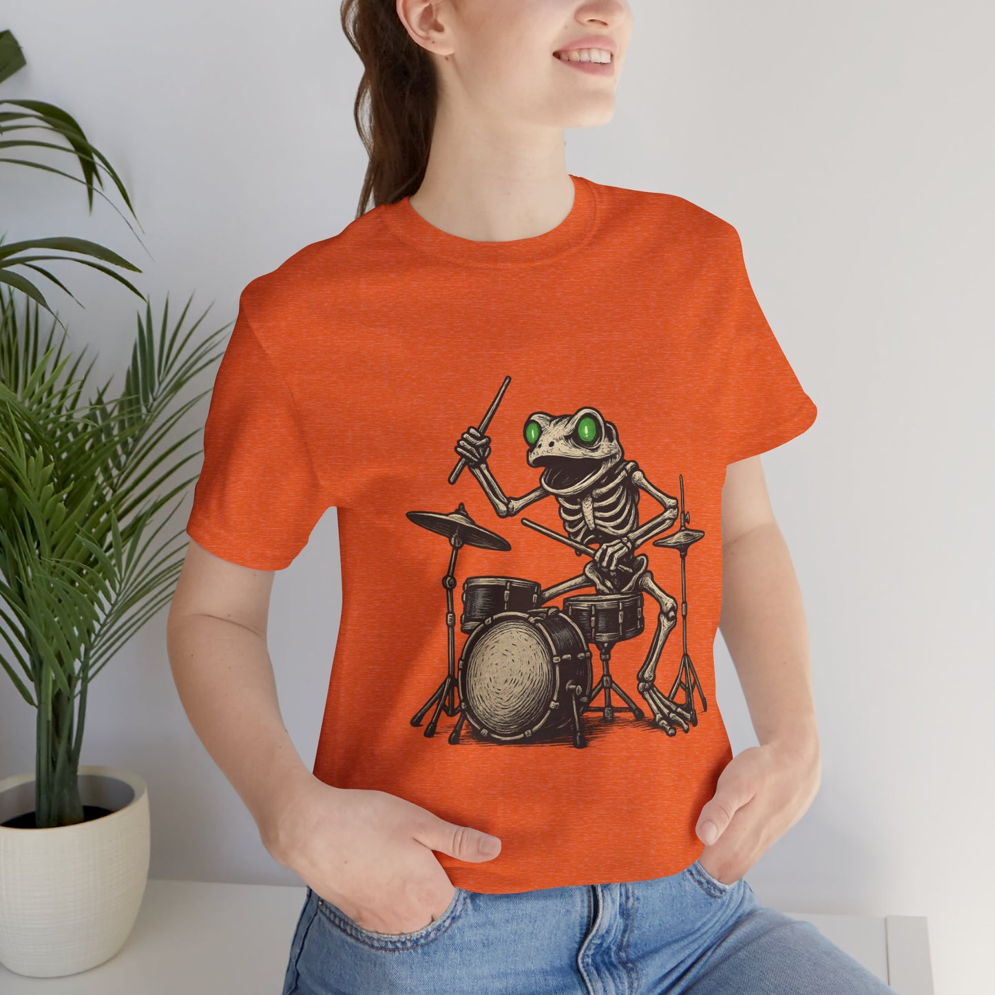 Skeleton Frog Drummer Shirt with Glowing Green Eyes Rock Band Art Tee for Musicians Frog Lovers Halloween and Concert Wear